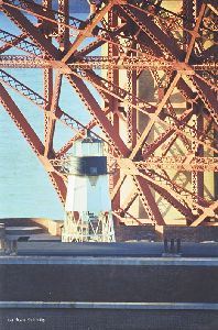The lighthouse underneath the Golden Gate Bridge.