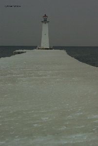 Several inches of ice cover the pier.