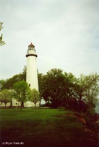The lighthouse as viewed from the shore of the lake.
