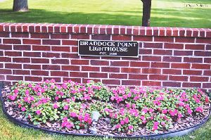 Brick wall in front of the lighthouse.