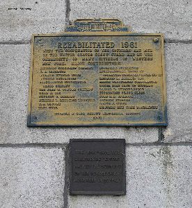 Plaque on the side of the Buffalo Main Lighthouse talking about the rehabilitation efforts in 1961.