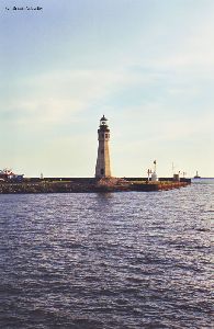 Three lighthouses on the horizon.