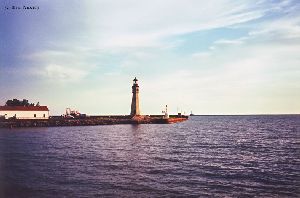 Sun starting to set by the Main Lighthouse.