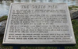 Plaque telling about the South Pier built in 1820 by the villagers of Buffalo.