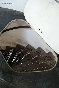Looking down through hatch to spiral stair case.