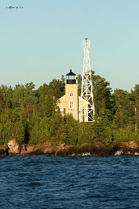The old light with the new steel tower.