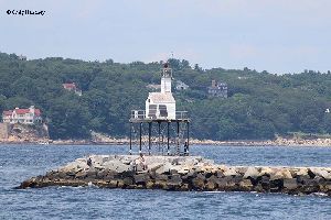 Beautiful photo of the Dog Bar Breakwater Light.