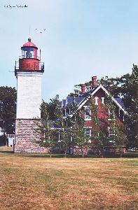 Side view of lighthouse and quarters.