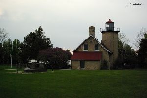 The lighthouse facing the bay.