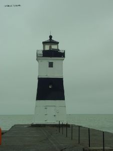The North Pier lighthouse stands alone.