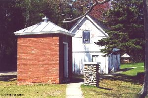 One of the outbuildings...most likely an oil / paint shed.
