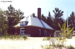 The fog signal building from the beach.