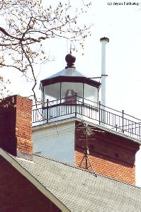 The lantern room with a close up shot of the Frensel lens.