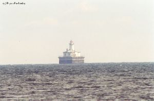 A decent shot of the lighthouse as it sits offshore.