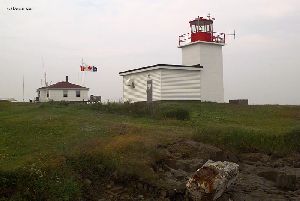 The lighthouse and the quarters.