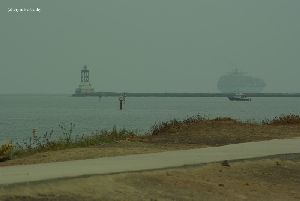 A ship leaves the port.