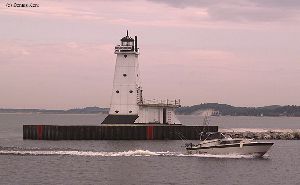 Beautiful shot of the Ludington Pier lighthouse.