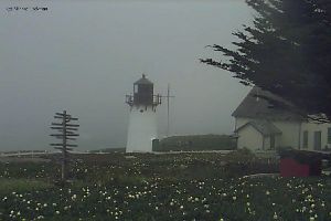 The lighthouse in heavy fog.