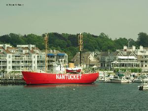The lightship docked in the harbor.