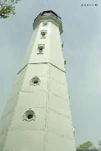 Side of the lighthouse showing the original and new halves of the tower.