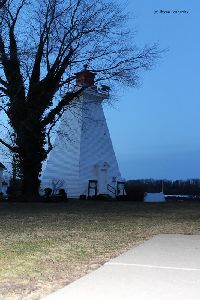 Dusk falls at the rear range light.