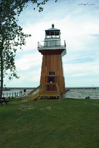 The replica lighthouse on shore.