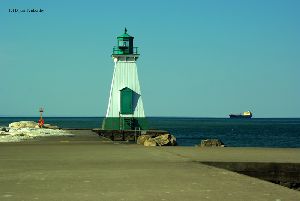 The lighthouse and a freighter.