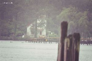 Front shot of the lighthouse from a dock.