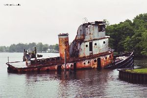 Sunken tugboat in the vicinity of the lighthouse.