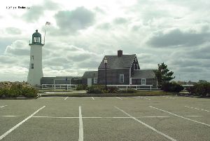 The lighthouse and parking lot.