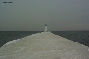 The pier is covered in ice.