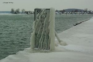 Ice covers the channel speed limit sign.