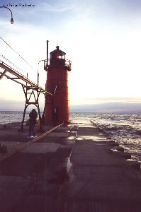 Nice shot of the lighthouse at the end of pier.
