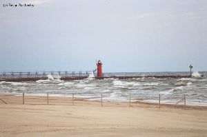 Waves crash against the breakwall at South Haven.