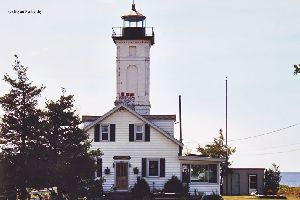 Dwelling, tower, and lake.