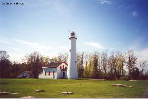 Beautiful shot of the lighthouse, quarters, and ground.