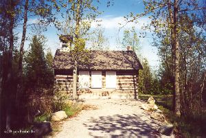 Log cabin on the grounds of the lighthouse.