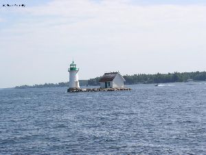 Shot of the lighthouse as the boat passes.