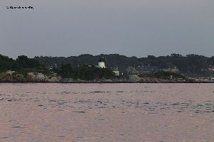 The Ten Pound Island Lighthouse at sunset.