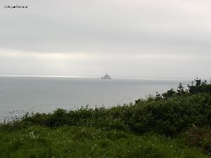 The lighthouse sits several miles off shore.