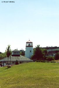 Shot of the lighthouse from a field.