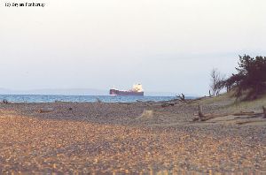 A Great Lakes freighter passes over the "Graveyard."