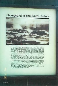 Graveyard of the Great Lakes sign near the lighthouse.