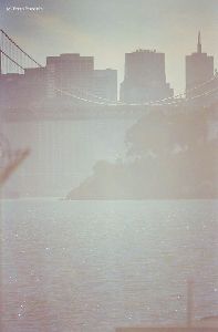 A hazy distant shot of the Yerba Buena Light.
